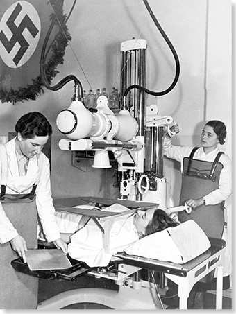 Radiological examination, 1933. A radiological examination in the Munich hospital on the left bank of the Isar river.