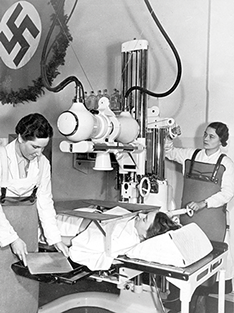 Radiological examination, 1933. A radiological examination in the Munich hospital on the left bank of the Isar river.